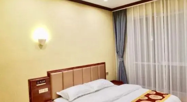 Qujing Tangke Hotel, Boek Hotel Qujing Yunnan