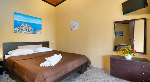 Апартаменты Platanes Apartments