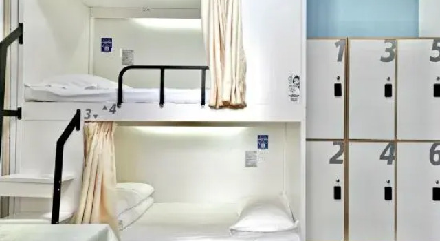 Кровать в общем номере Xi'an FanHuaLi Hostel (Xiaozhai Sports Stadium Subway Station)