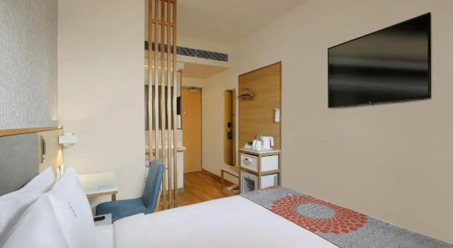 Кровать в общем номере Holiday Inn Express Pune Pimpri by IHG