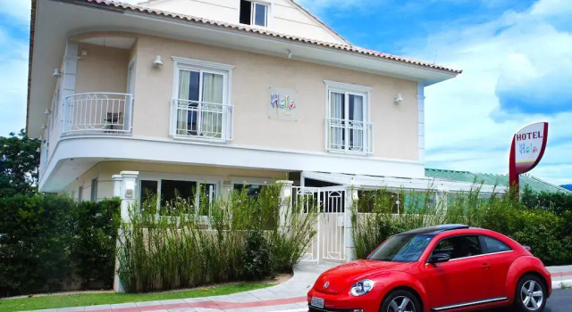 Hotel Hola, Забронировать Отель Отели в центре Lagoa da Conceicao с завтраком, отели в центре Lagoa da Conceicao с завтраком