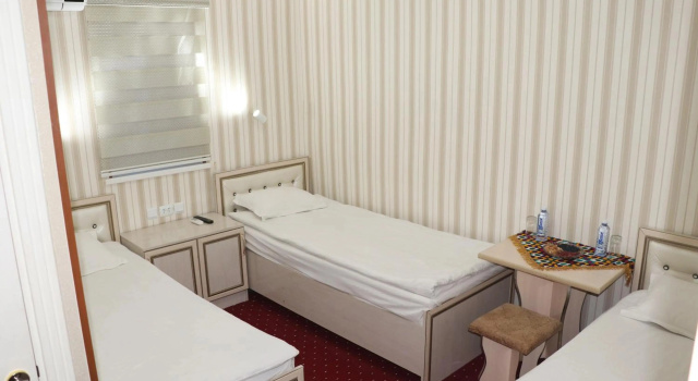 Shodlik Guest House, Reservar Casa de hóspedes Hotéis em Khorezm region com estacionamento, Estacionamento