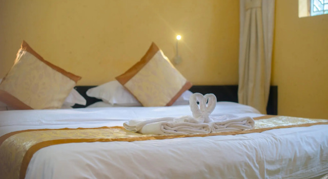 Orchid Land Boutique Inn, Забронировать Курортный отель Лицзян Юньнань, рядом с Улица Сквер-стрит Древнего города Даянь