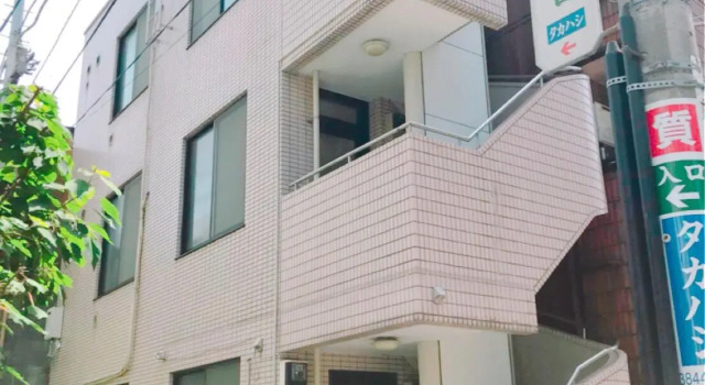 Кровать в общем номере HOTEL PRELE Shinkan ホテルプレール新館