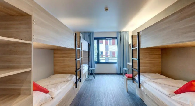Кровать в общем номере MEININGER Hotel Wien Downtown Franz