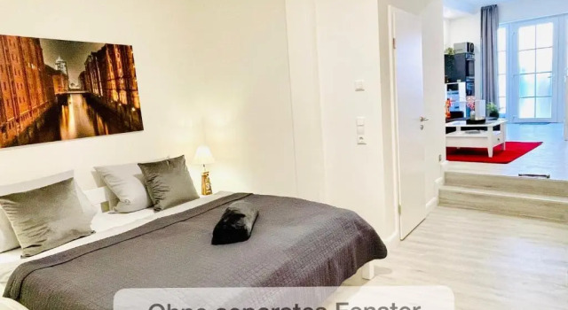 Апартаменты Цокольный этаж Schöne Ferienwohnungen teilweise mit Dachterrasse im Herzen von Itzehoe
