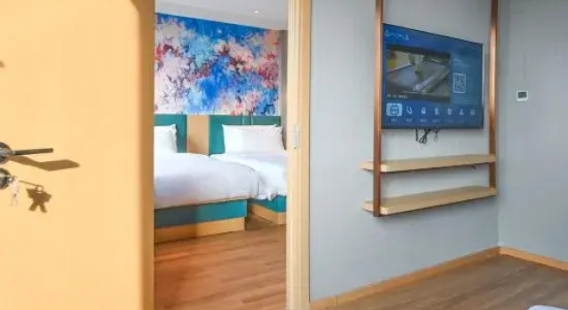 Люкс Deluxe Magnotel Hotel (Yantai Penglai Bus Station Dengzhou Road)