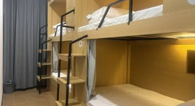 Pat în dormitor (dormitor pentru bărbați) Guanwo Hostel