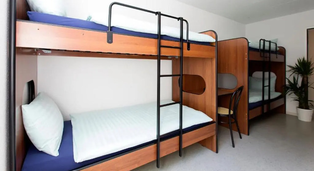 Кровать в общем номере Casa di vacanza Giovanibosco