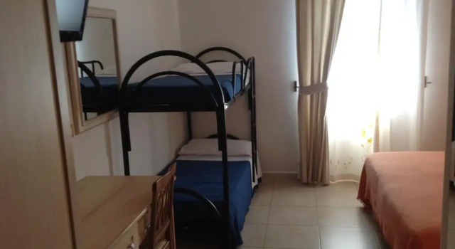 Четырёхместный номер Economy Hotel Corallo