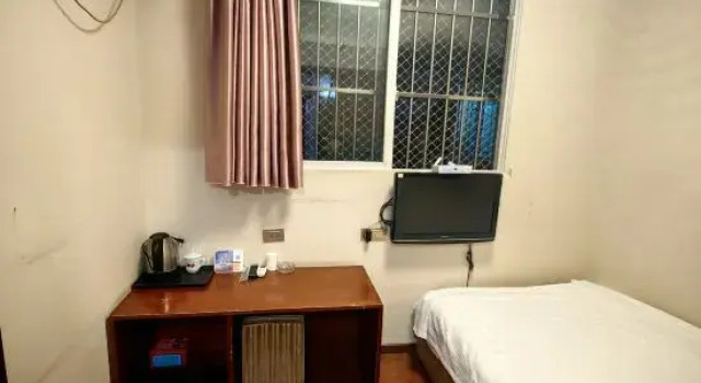 Номер Economy Tongjiang Harmony Hotel