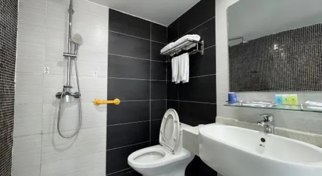 Двухместный люкс Sucheng Chain Hotel (Huangmei Zhongbai Warehouse)