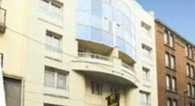 Кровать в общем номере Hotel Bootcamp