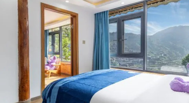 Люкс Luanxi Flower Pinellia Homestay (Qianhu Miao Village Branch, Xijiang)