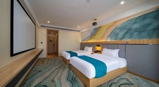 Jinlong  Cloudland Hotel （De'an Railway Station Liansheng Happy City Branch), Book Hotel Hoteller i Jiujiang med parkering, Parkering