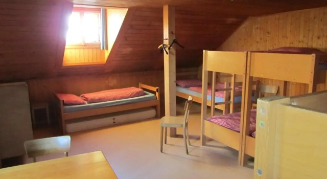Кровать в общем номере Jugendherberge Hospental