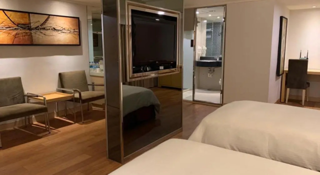 Номер Deluxe Delton Hotel