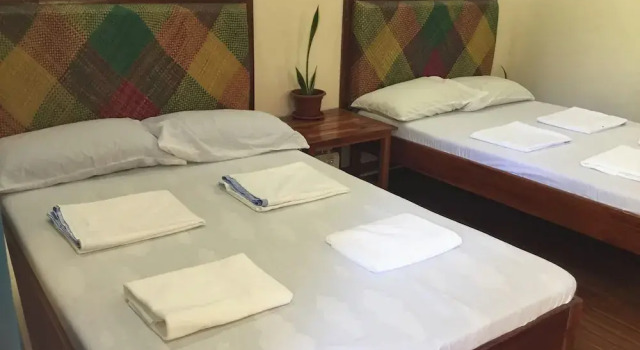 Room-camiguin Lanzones Resort Family roo, Забронировать Курортный отель Мамбахао 