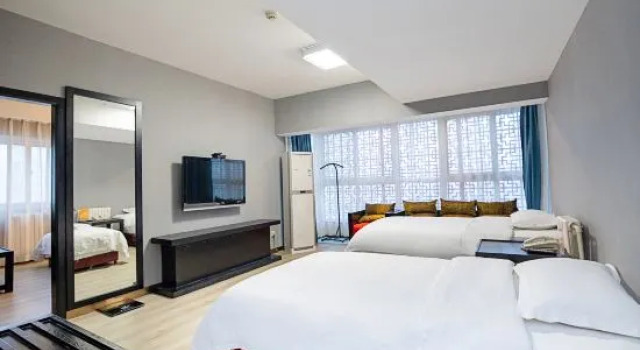 Семейный люкс Deluxe Maigode Hotel (Henan People's Hall Yanzhuang Metro Station)
