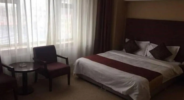 Wu Su Li Hotel, Varaa Hotelli Mudanjiang Heilongjiang