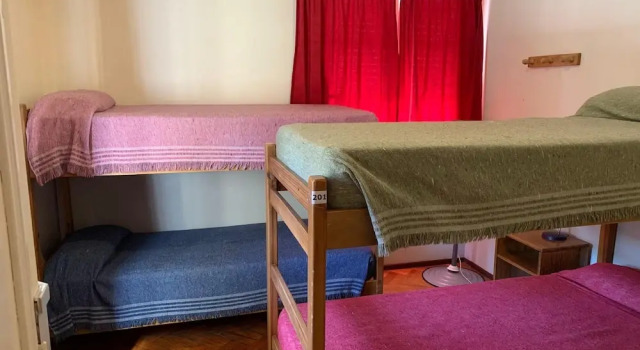 Кровать в общем номере Alamo Hostel & Suites