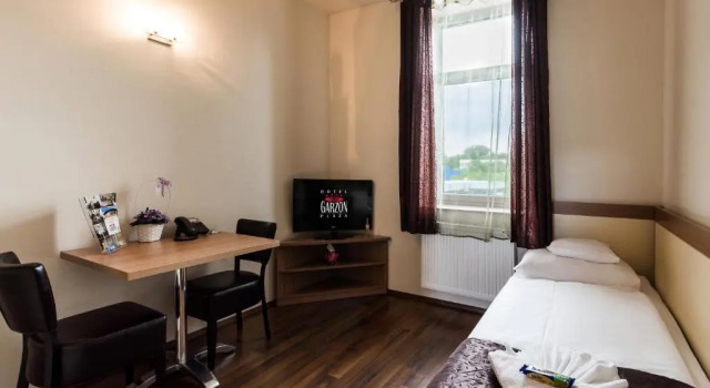 Апартаменты Hotel Garzon Plaza