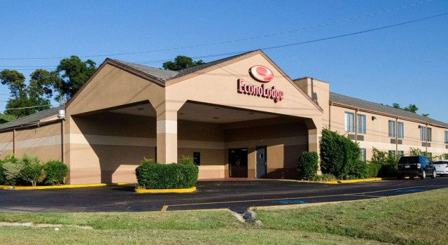 Кровать в общем номере Econo Lodge Yazoo City