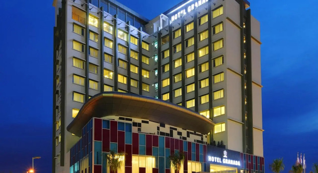 Кровать в общем номере Hotel Granada Johor Bahru