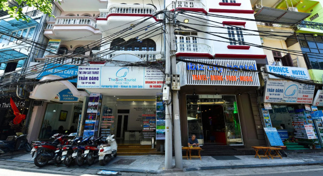 Кровать в общем номере The Tourist Hotel