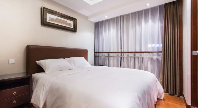 Люкс Deluxe Qingdao Jinshan We Holiday Apt Wusi
