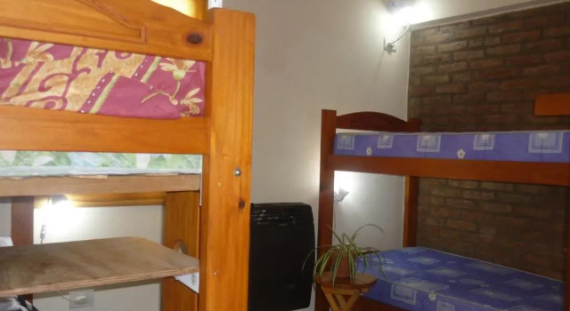 Кровать в общем номере Hostel Aves del Lago