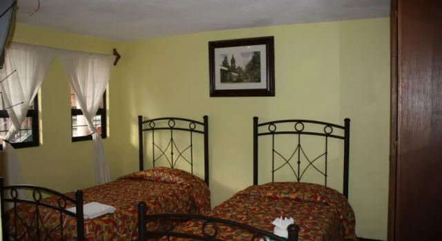 Четырёхместный номер Standard Villas Hotel Cholula
