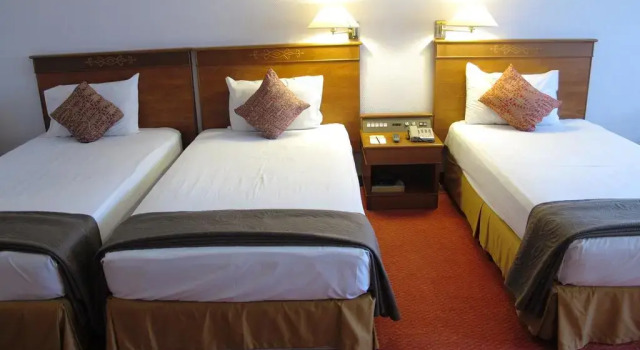 Luksusowy trzyosobowy pokój Hotel Grand Continental Kuching