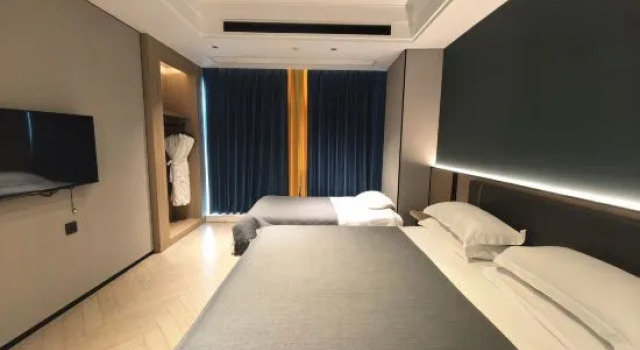 Familie Suite Manju Hotel (Shaoxing Didang Shimao Plaza)