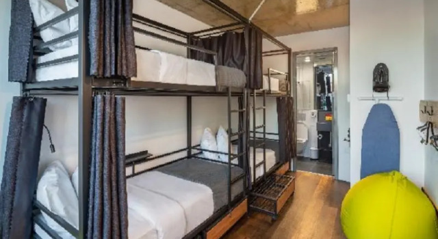 Кровать в общем номере Artel Hotel