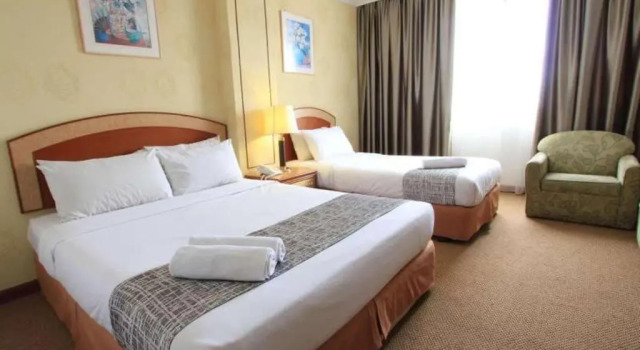 Трёхместный номер Executive Pelican Hotel