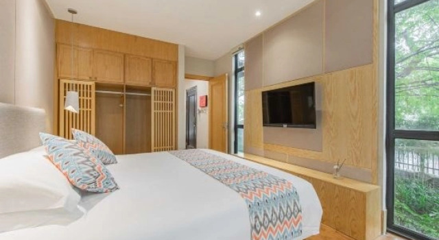 Люкс c 1 комнатой с видом на горы Naxiang Garden Hostel