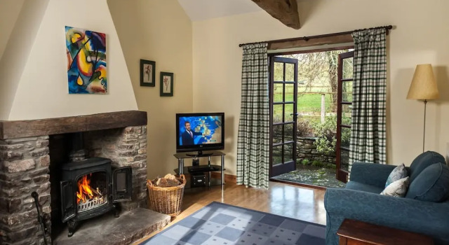 Cottage With Folding-doors in a Calm Environment Surrounded by Farming Fields