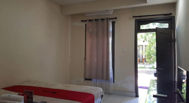 RedDoorz near Pantai Timba Batu Lombok, Buchen Sie Hotel Labuhan Pandan Lombok