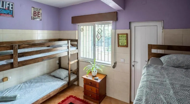 Кровать в общем номере Natural Mystic Hostel