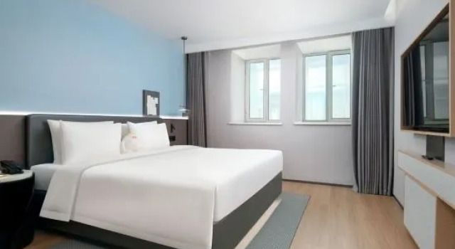 Люкс Deluxe Country Inn & Suites by Radisson,  Urumqi Convention and Exhibition Center Wuyue Plaza Hotel