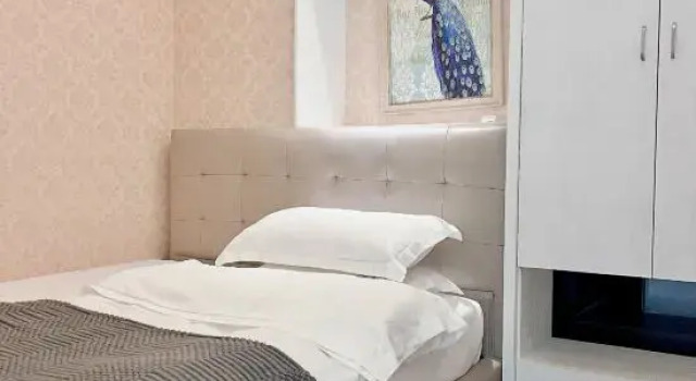 Четырёхместный люкс с 2 комнатами с балконом и с видом на море Nan'ao Linjia Scenic Apartment (Qing'ao Bay Tropic of Cancer Square)