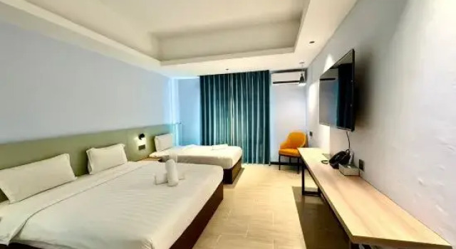 Номер Deluxe Wing Tat Grand Hotel