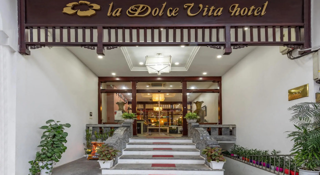 Кровать в общем номере La Dolce Vita Hotel