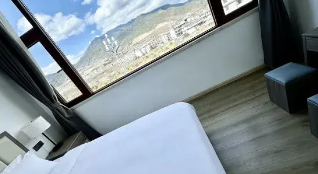 Кровать в общем номере shan ye inn