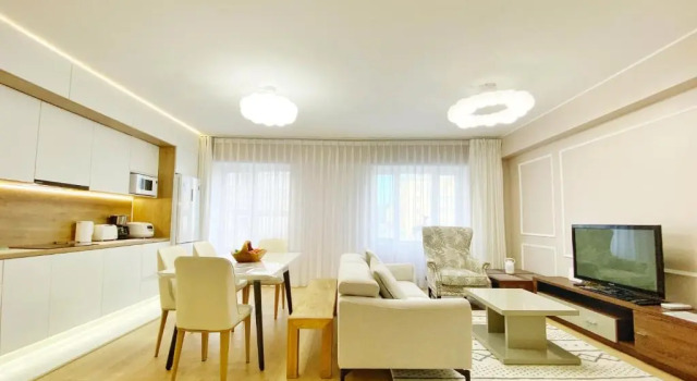 Апартаменты 105m2 Central 3 BR new apartment w airport pickup