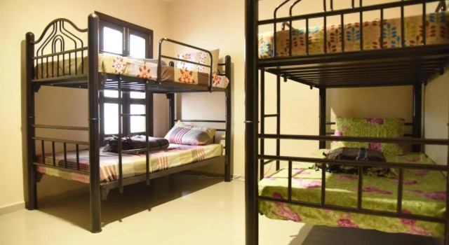 Кровать в общем номере Hostal Encounter Guanajuato