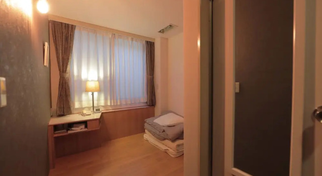 Кровать в общем номере (женский номер) Hotel Sun Garden Matsuyama
