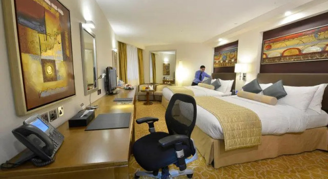 Кровать в общем номере Intercontinental Al Jubail by IHG