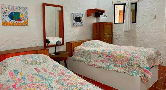 Кровать в общем номере Hostal Galapagos by Bar de Beto